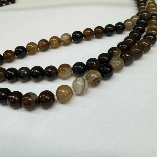 Achát tmavě hnědý pruhovaný 8mm (45ks) - sicipotreby